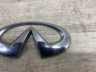 934911LA0A Эмблема крышки багажника Infiniti QX56 2 Арт 2-485449, вид 5