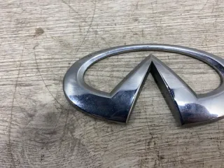 934911LA0A Эмблема крышки багажника Infiniti QX56 2 Арт 2-485449, вид 6